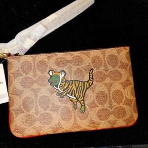 Coach Lunar New Year Small Wristlet In Signature Canvas With Tiger Rexy …